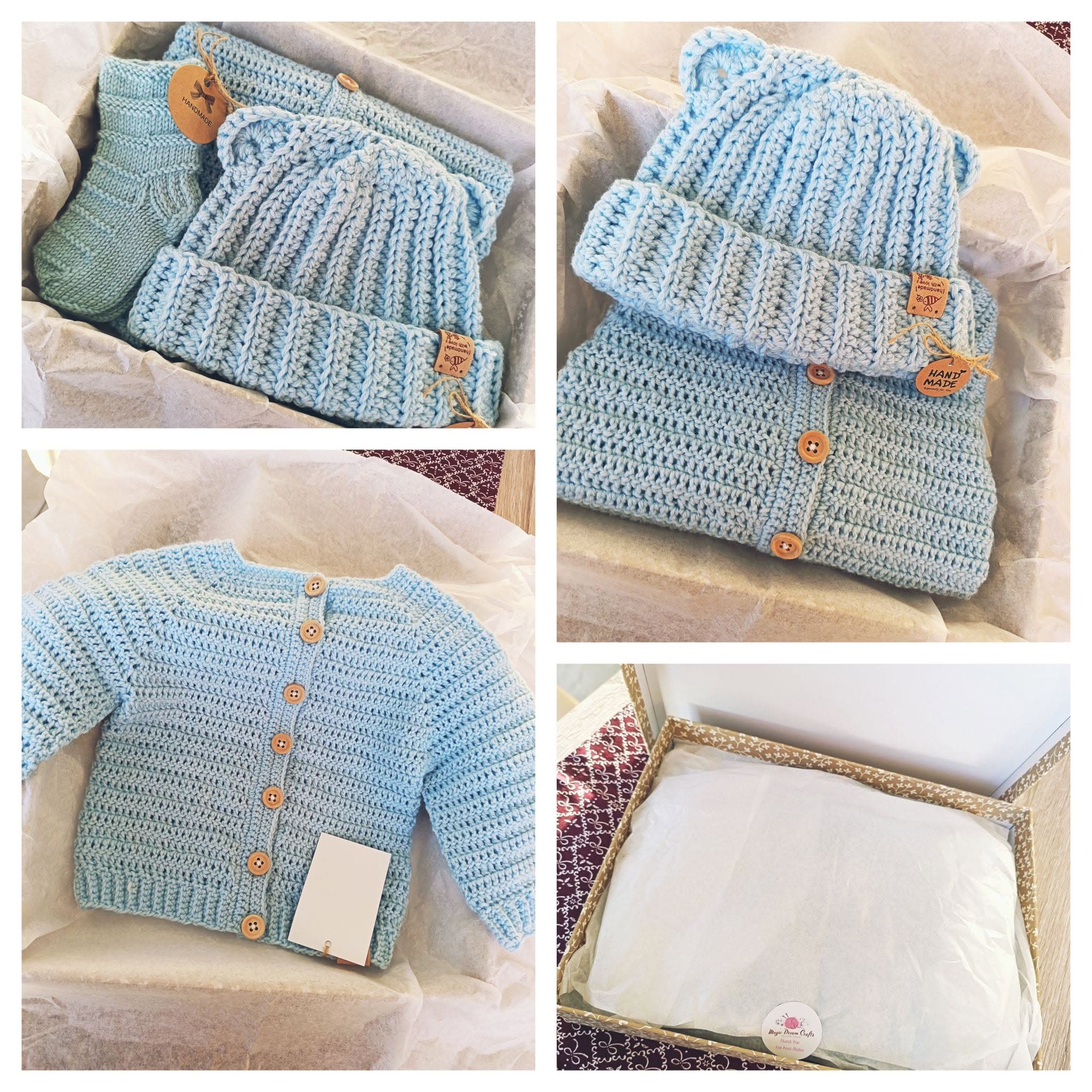 A baby boy's handmade cardigan, hat and socks presented as a gift set